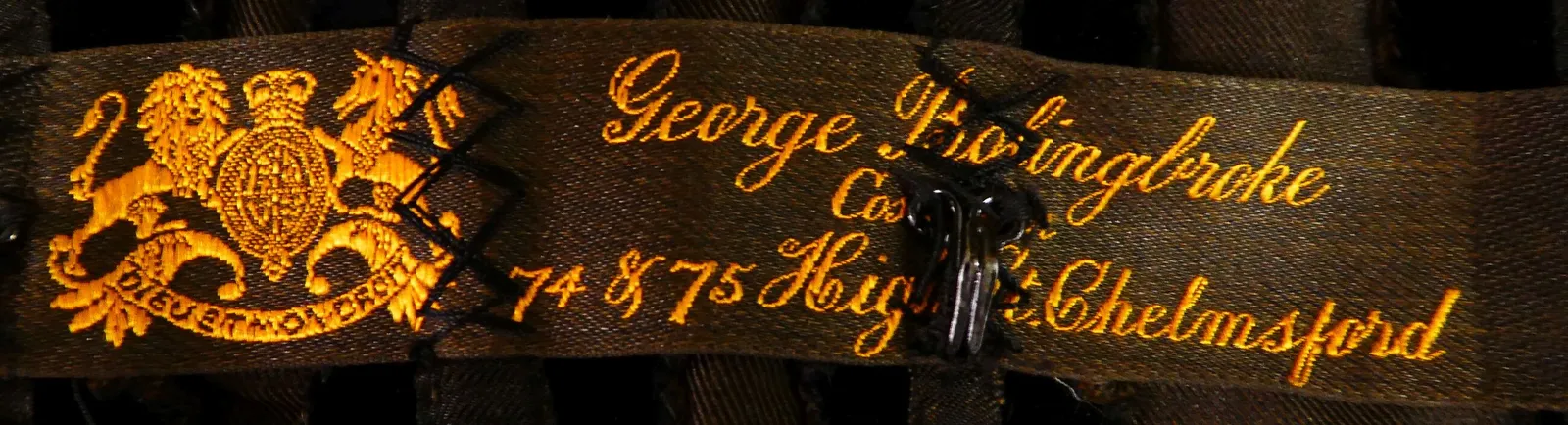 Label with textGeorge Bolingbroke / Costumier / 74 & 75 Highstreet Chelmsford