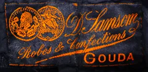 Label met tekst D. Samson / Robes & Confections / Gouda