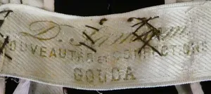 Label met tekst D. Samsom / NOUVEAUTÉS ET CONFECTIONS / GOUDA'