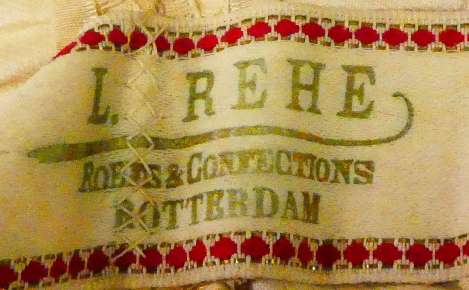 Label with textL. Rehe / Robes & Confections / Rotterdam