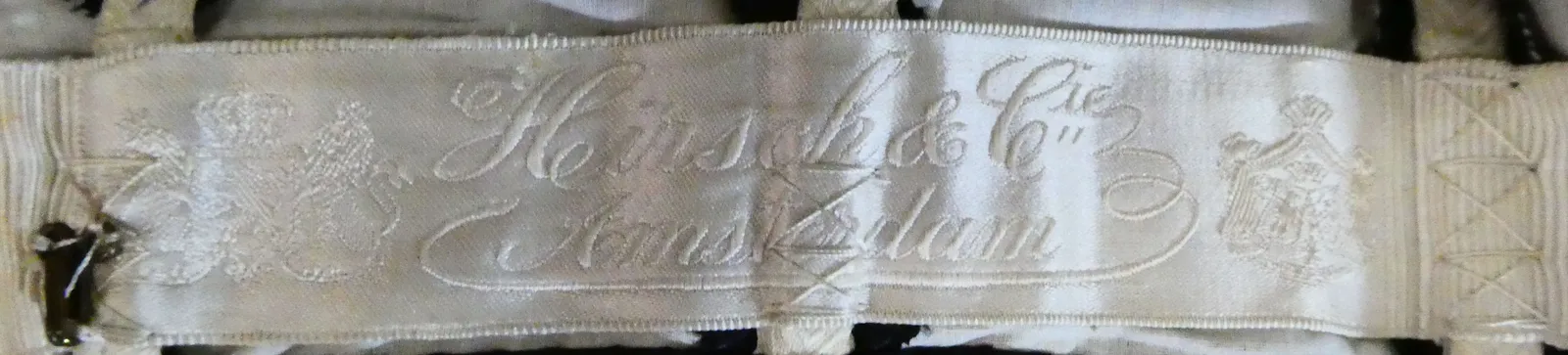 Label with textHirsch & Cie / Amsterdam