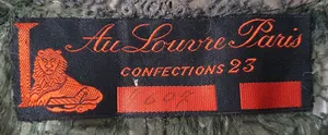 Label van Au Louvre Paris