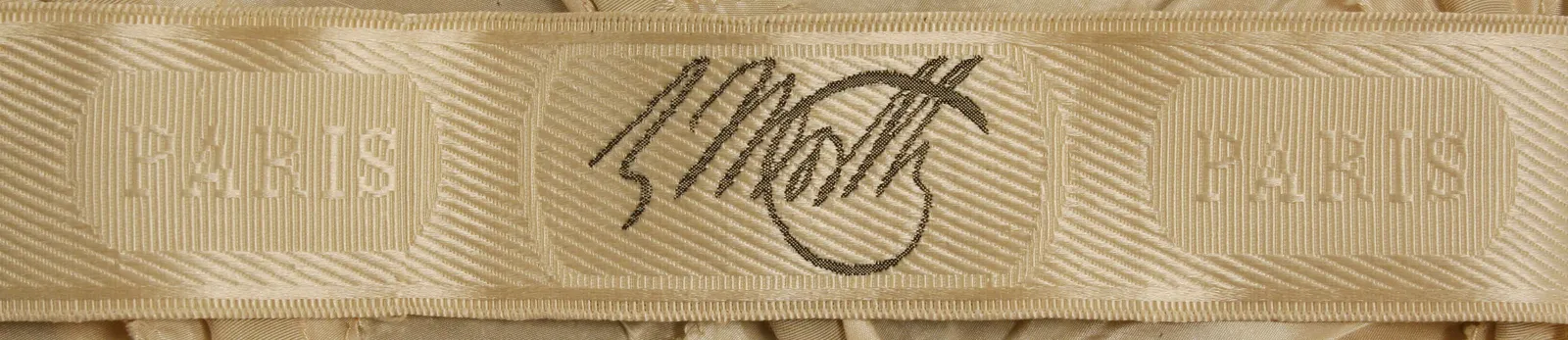Label van House of Worth