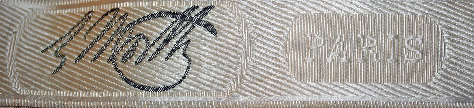 Label van House of Worth