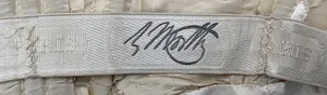 Label van House of Worth