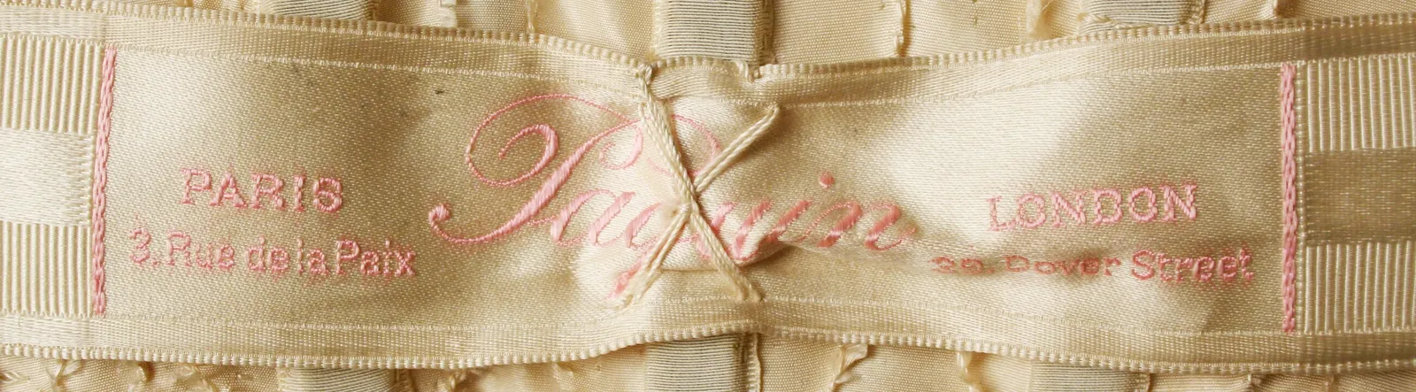 Label van House of Paquin