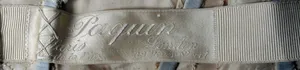 Label van House of Paquin
