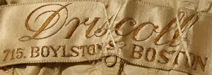 Label met tekst Driscoll / 715. BOYLSTON ST. BOSTON