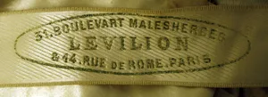 Label met tekst 31. Boulevart Malesherbes / Levilion / & 14. Rue de Rome. Paris