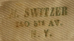 Label met tekst M. SWITZER/ 140 5th AV./N. Y.