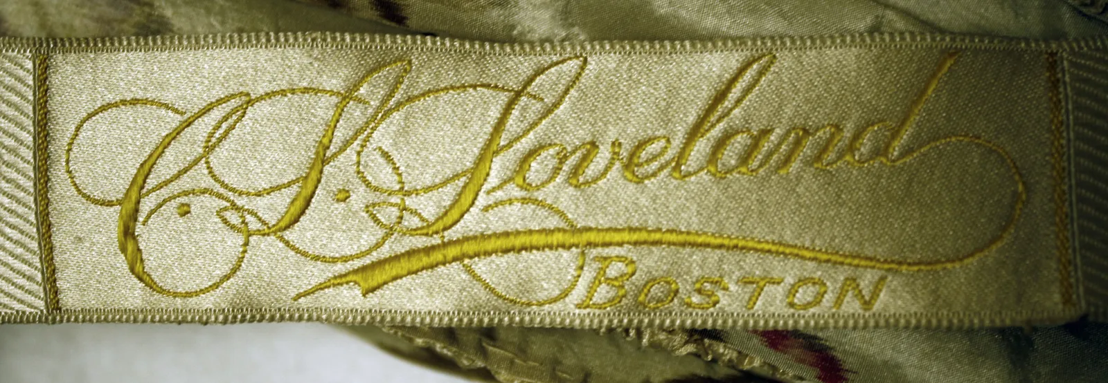 Etiquette avec texte C.L. Loveland / Boston