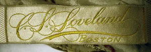 Label met tekst C.L. Loveland / Boston
