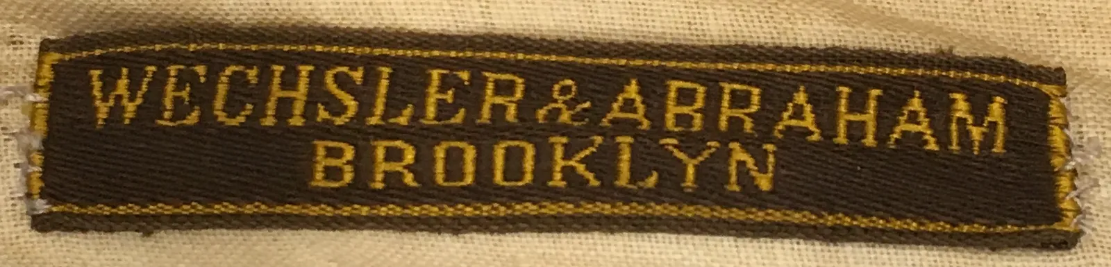 Label met tekst Wechsler & Abraham / Brooklyn