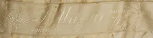 Label met tekst S. Ungar, Karlsbad -Wien /  K.U.K Hoflieferent