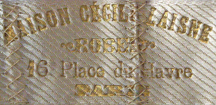 Label with textMaison Cecile Laisne / Robes / 16 Place du Havre / Paris