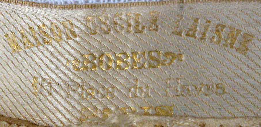 Label with textMaison Cecile Laisne / Robes / 16 Place du Havre / Paris