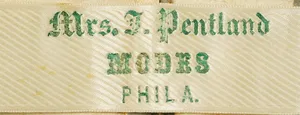 Label met tekst Mrs. J. Pentland / Modes / Phila.