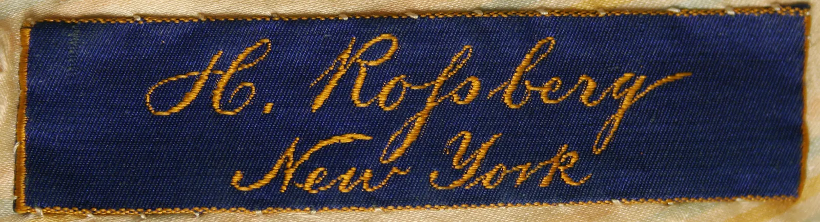 Etiquette avec texte H. Rossberg / New York