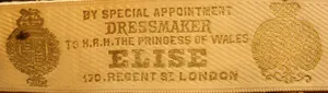 Label met tekst by special appointment, Dressmaker to H.R.H. the Princess of Wales / ELISE/ 170 Regent St. London