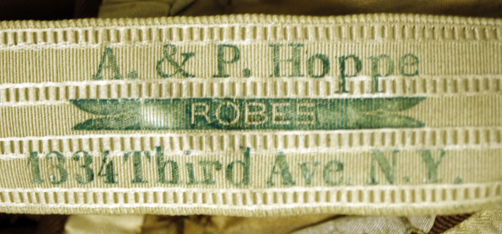 Label with textA. & P. Hoppe/ ROBES/ 1334 Third Ave. N. Y.