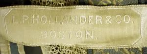 Label met tekst L.P. Hollander & CO., Boston