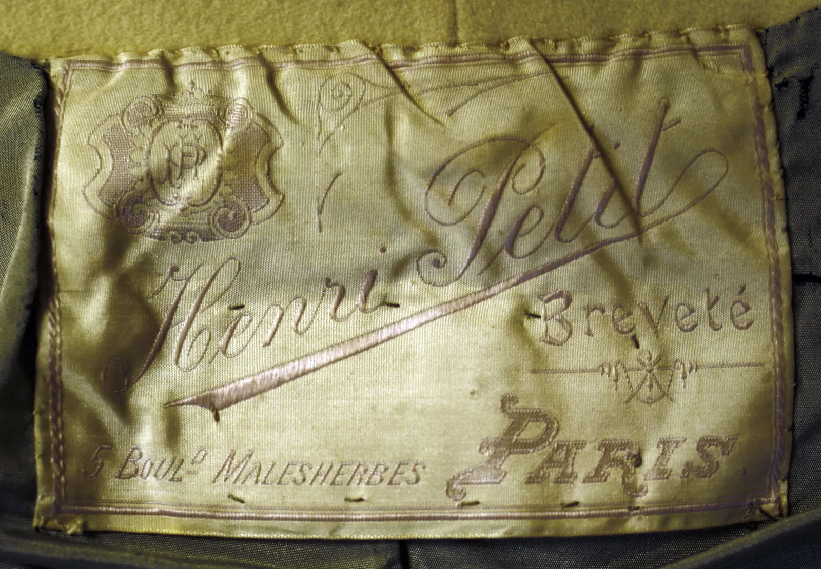 Label with textHenri Petit / Brevete / 5 Bould. MalesherbesParis