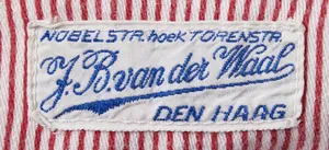 Label met tekst NOBELSTR. hoek TORENSTR. / J.B. van der Waal / DEN HAAG