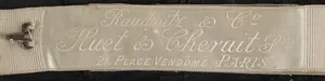 Label met tekst Maison Raudnitz & Co / Huet & Cheruit Srs / 21. PLACE VENDOME PARIS